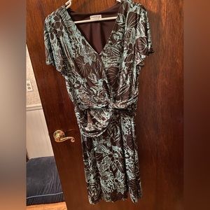 Dress unique style. Green with brown/black background